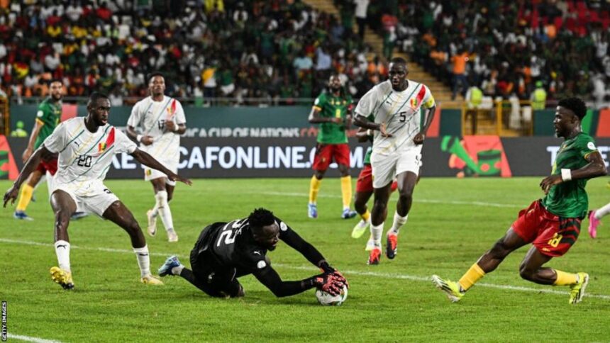 Toothless Cameroon were held to a draw by 10-man Guinea