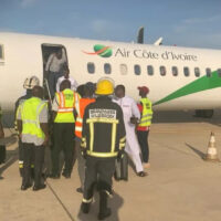 Players seen stepping out of the flight used by the Gambia Afcon squad