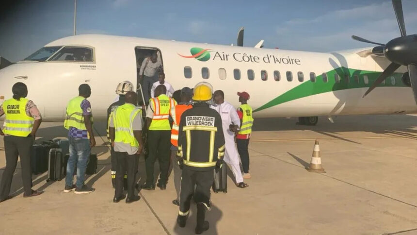 Players seen stepping out of the flight used by the Gambia Afcon squad