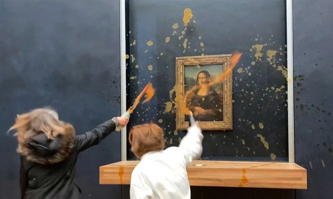 Protesters throw soup at the Mona Lisa