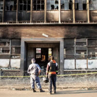 Man held for murder over South Africa building fire
